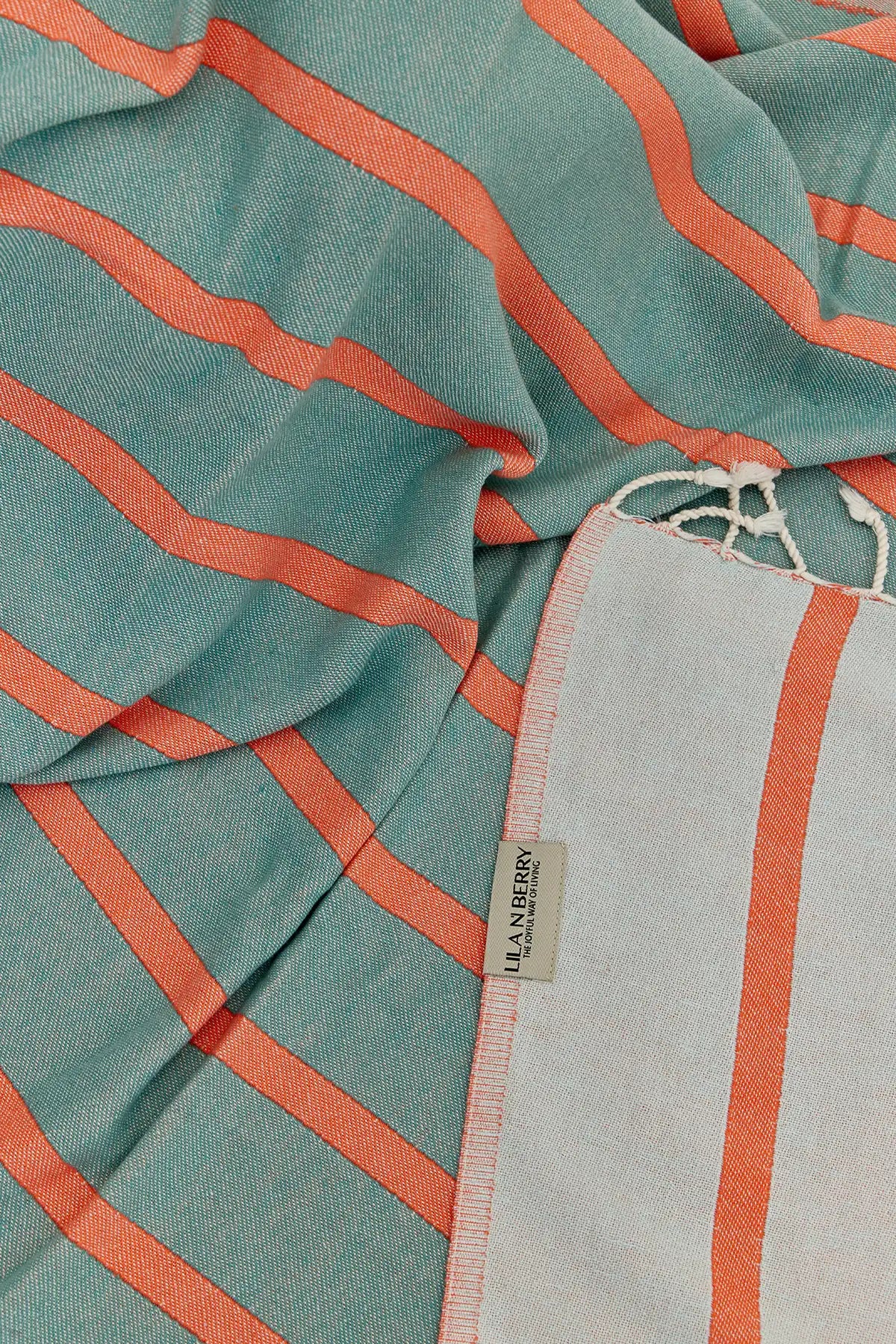 Lane Turkish towel in Peach Cream – Close-up draped towel showing detail and texture