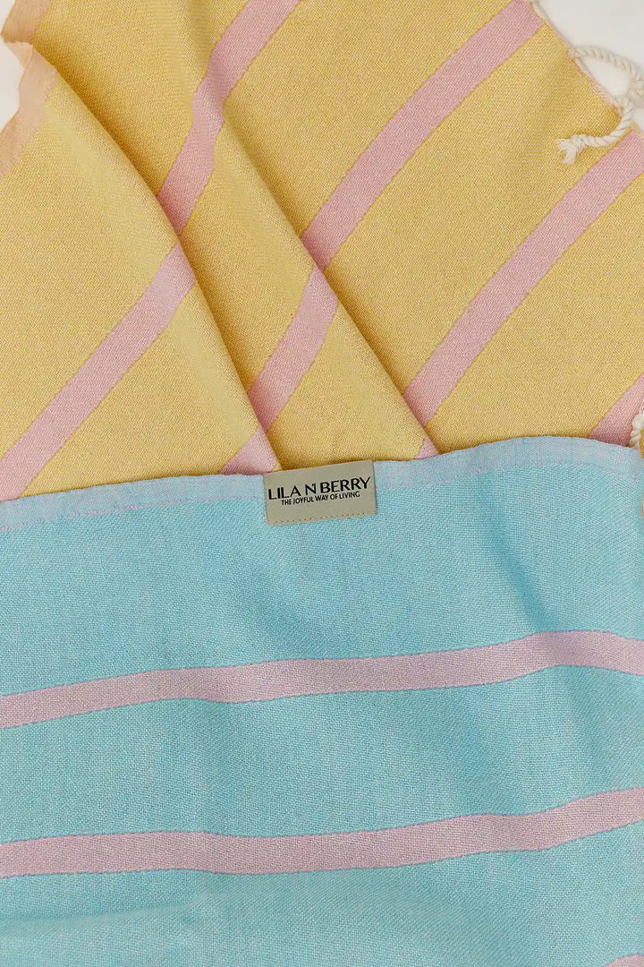 Lane Turkish towel in Pink Blue – Close-up draped towel showing detail and texture