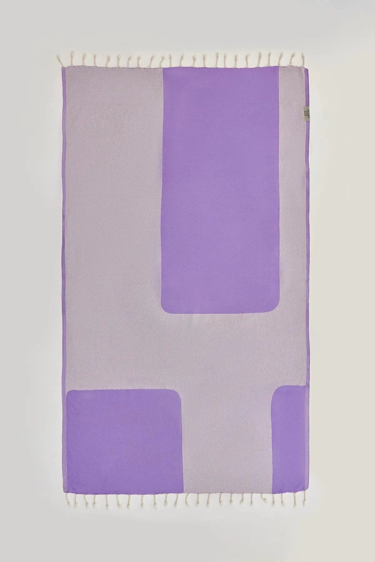 La Luna Turkish towel in Lilac – Flat lay back side showing reverse weave