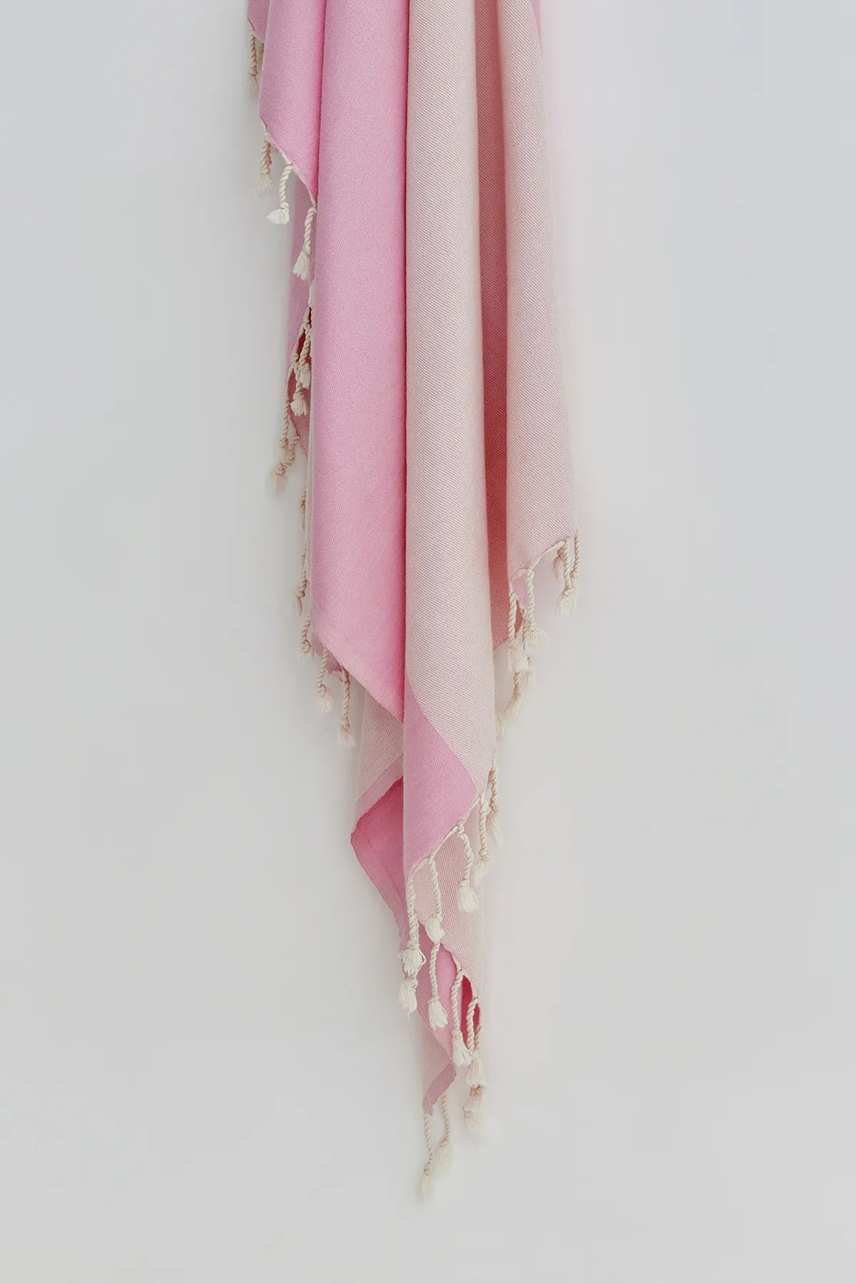 La Luna Turkish towel in Pink Blush – Close-up hanging towel highlighting weave and softness