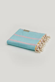 Lane Turkish towel in Pink Blue – Neatly folded towel, compact and ready for use