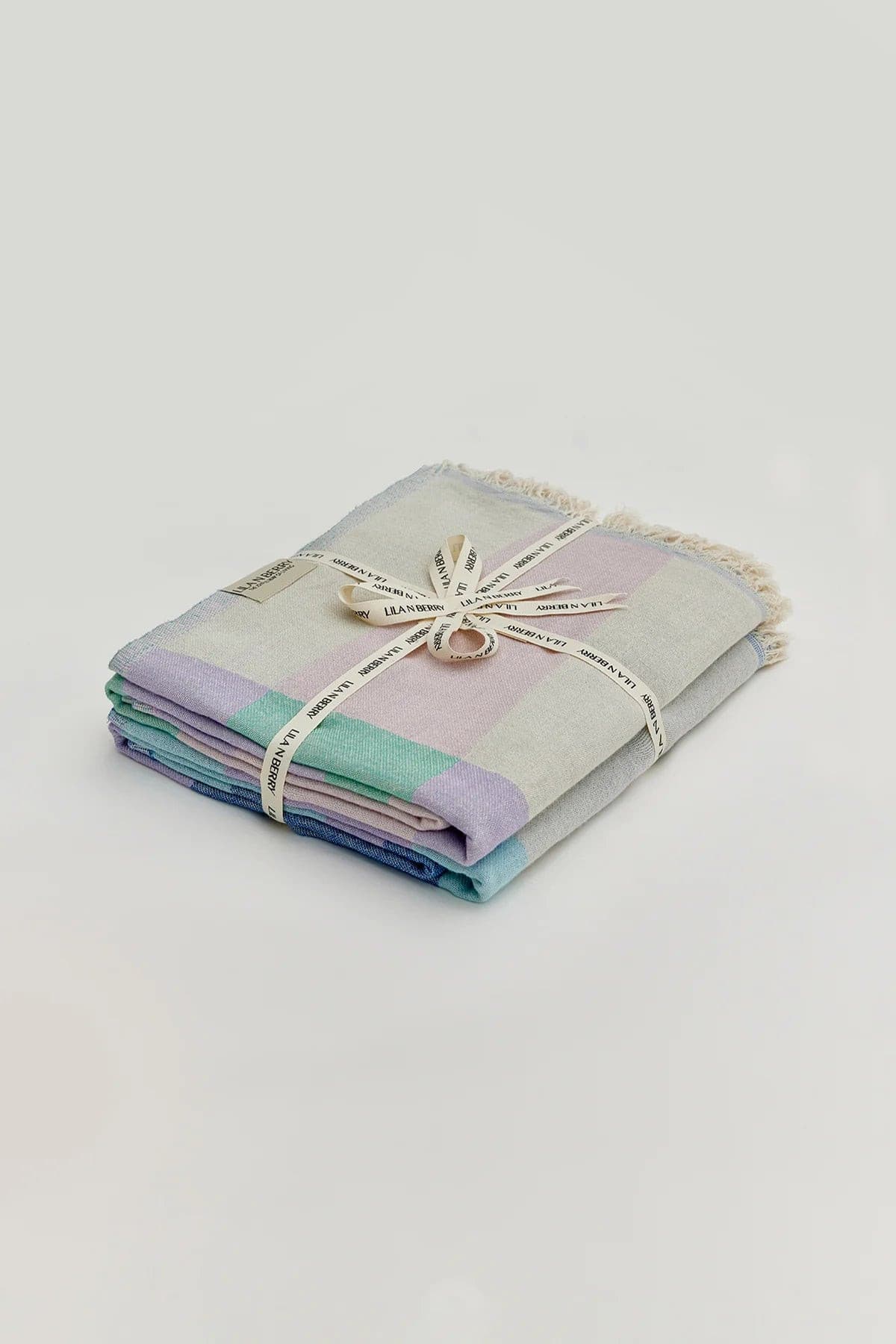 Pale Pluie Bundle – Folded bundle with multiple towels, tied with LILA N BERRY ribbon