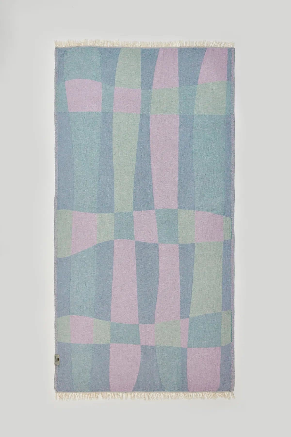Pale Pluie Turkish towel in Mellow Green – Flat lay back side showing reverse weave