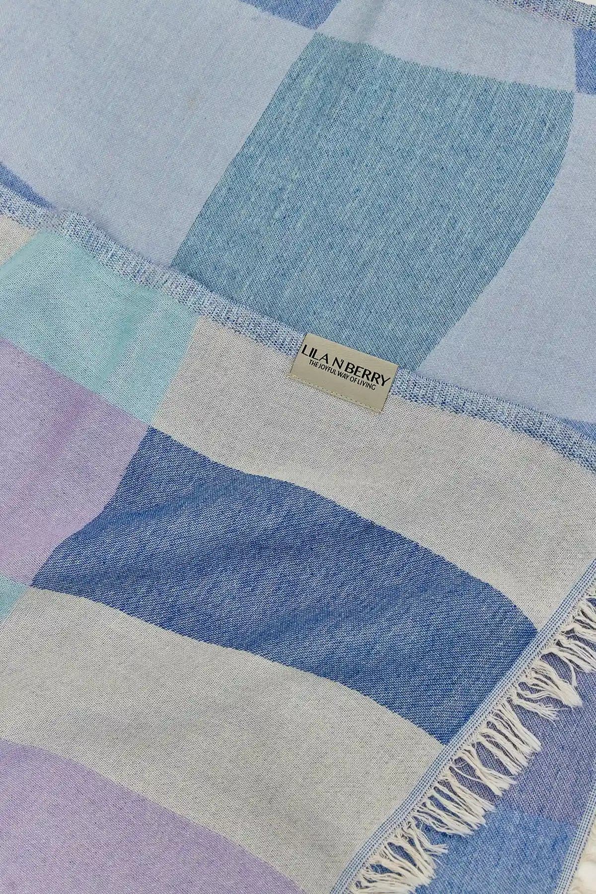 Pale Pluie Turkish towel in Mellow Indigo – Close-up draped towel showing detail and texture